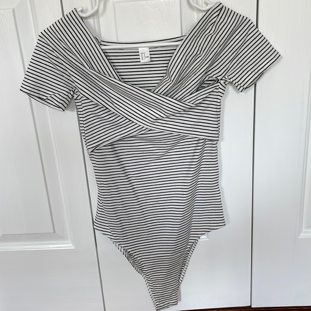 Never worn striped body suit, size S